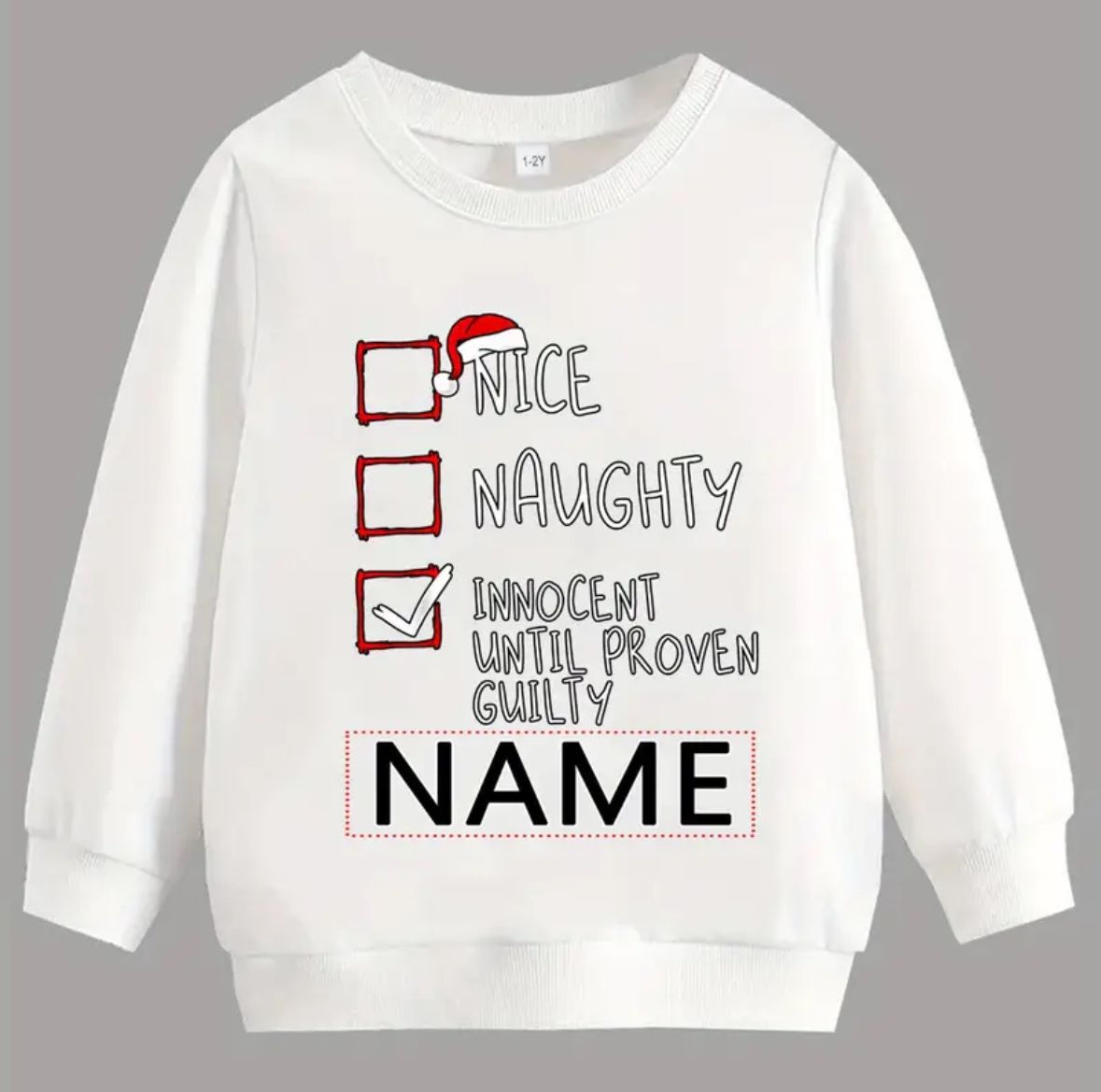 Children's Nice-Naughty-Innocent Until Proven Guilty Christmas Jumper